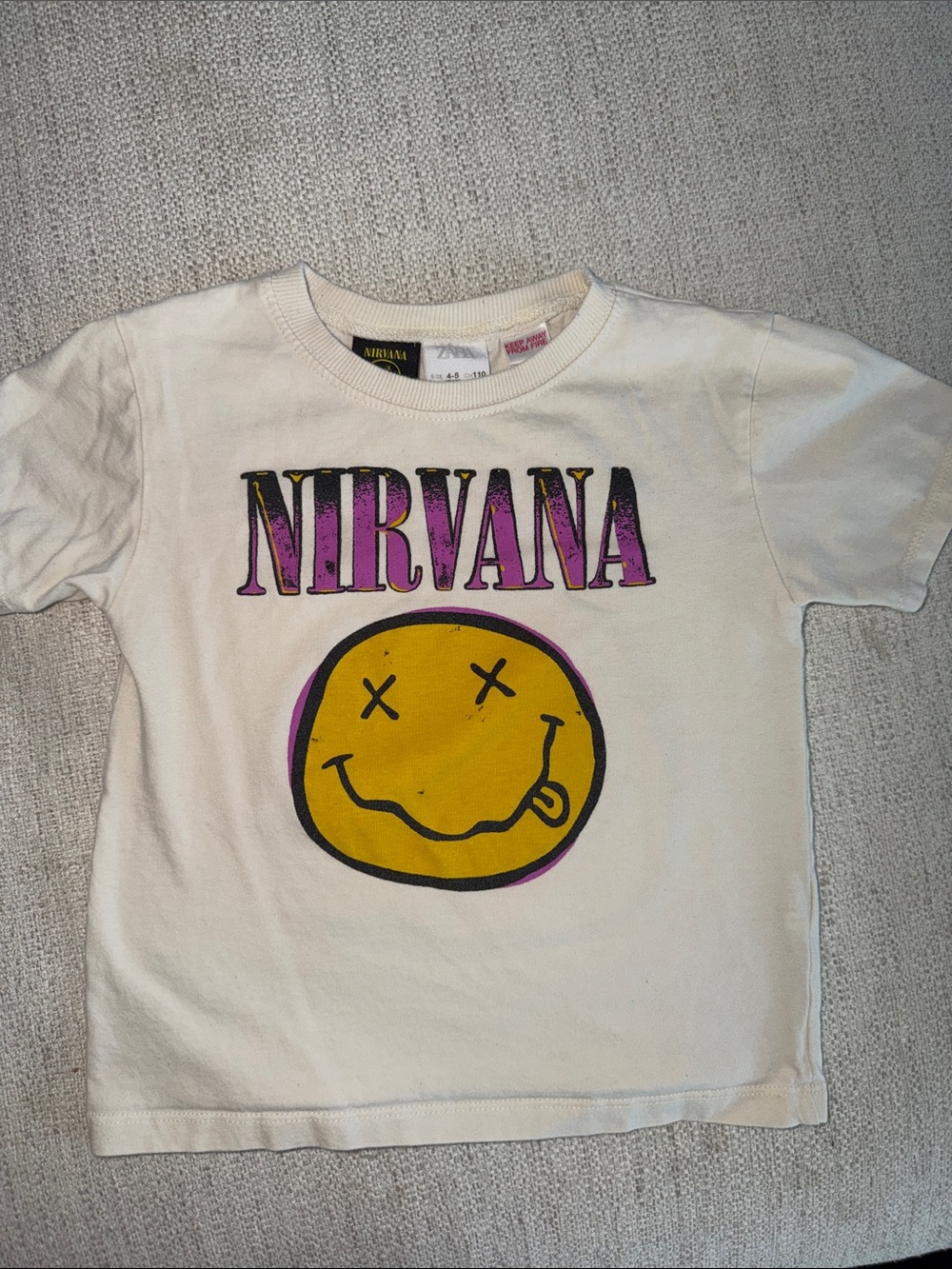 Zara Nirvana Cream Tee with Yellow Smiley and Purple Logo